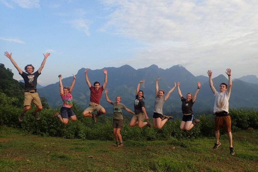 A group of teenagers jumping for joy