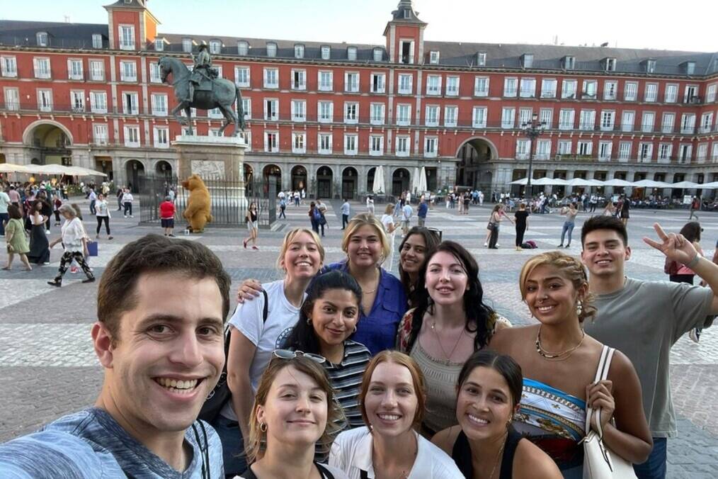 A group of friends in Madrid Plaza in Spain