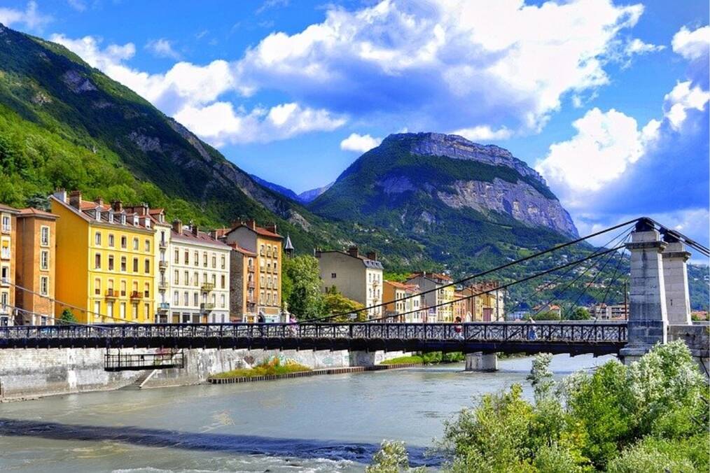 A mountain side river and bridge in Grenoble, France