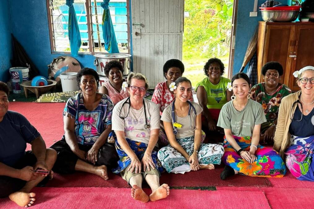 Volunteer medics sat down with their host