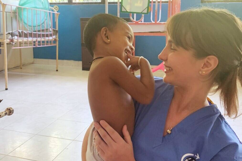 A nurse and a young patient