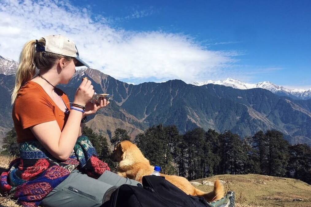 A person sat down overlooking the mountains in Nepal
