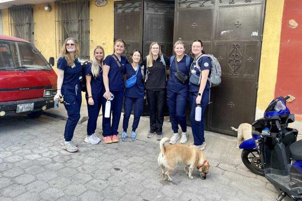 A group of medics in front of a building