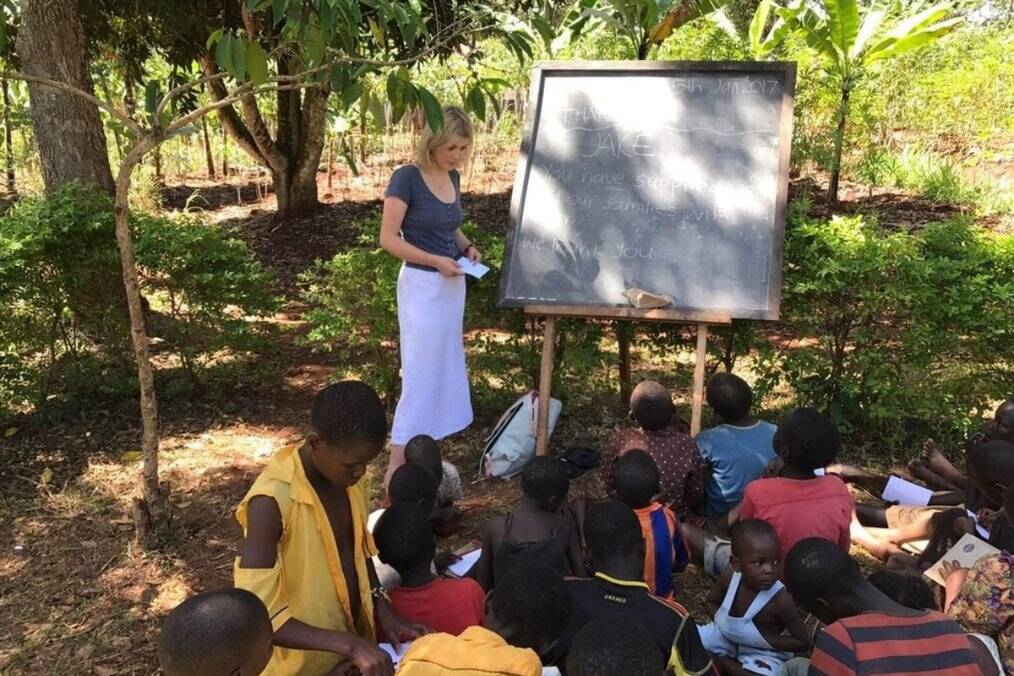 A teacher leading an outdoor classroom