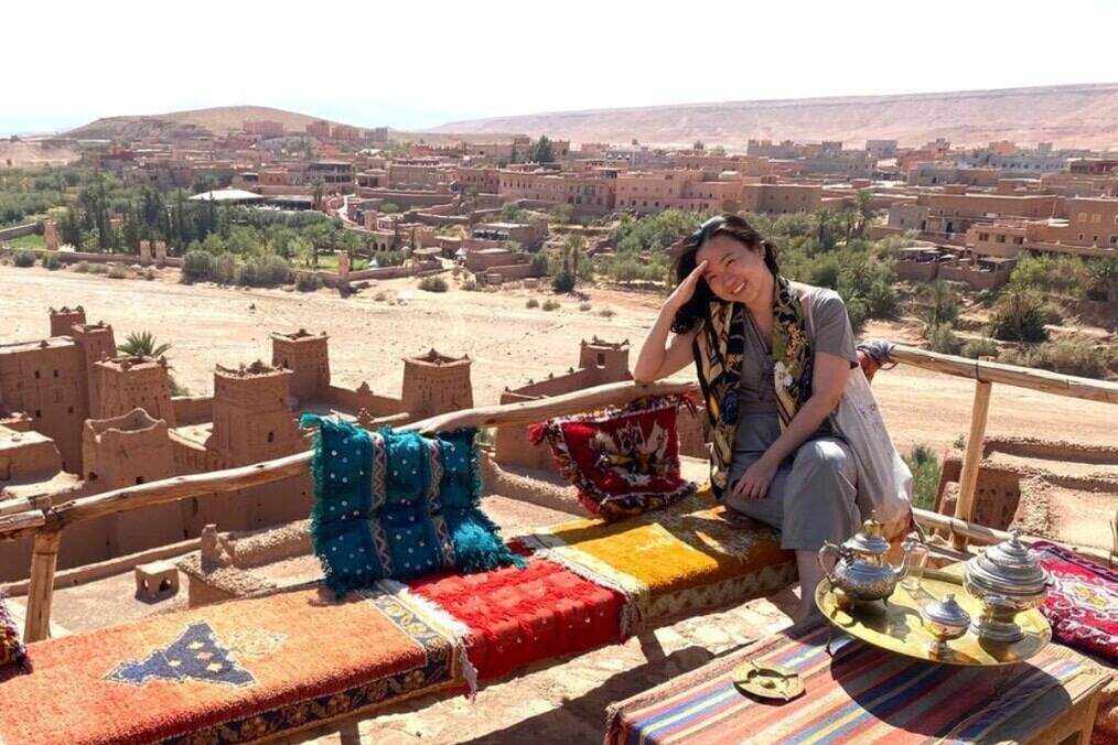 A person having tea in the desert