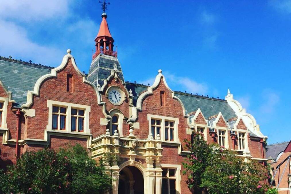 The exterior of a university library on a sunny day 