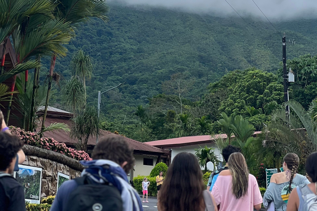 Group of students walking up to an inactive volcano