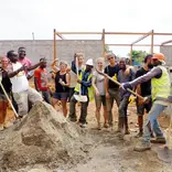 Volunteers on the Rising Education Centre site