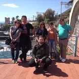 Group of people in front of ocean