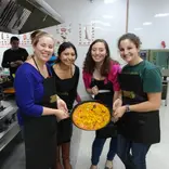 IES Abroad Salamanca students cooking a traditional Spanish dish 