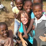 a volunteer working with kids