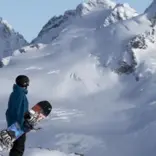 Snowboarding in the mountains
