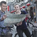 Students looking at map in China