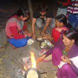 Open fire cooking in an Indian village.