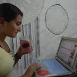 girl studying at desk on laptop