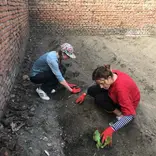 Volunteers in Nepal planting vegetable garden