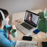 Young woman learning on laptop