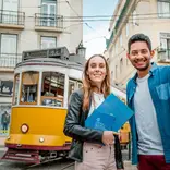 Students pose in front of a cablecar in Lisbon, Portugal