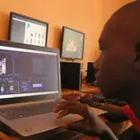 Sam attending our computer lessons at our drop-in-center.