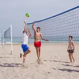 CAMPERS PLAYING BEACH VOLLEY AT IBERIAN CAMPS
