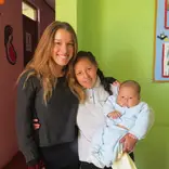 A volunteer with a teenage mother