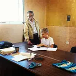 Spanish teacher and student in class