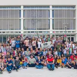Group shot of FIU ELI students holding their country's flags.