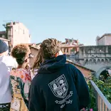 3 students looking into the distance