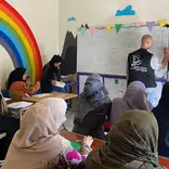 Teacher teaching students ESL