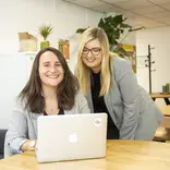 Two interns working at the office