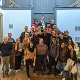 Students pose for a photo with the WESLI Teacher Training Program graduates