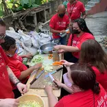 volunteers preparing food at the soup kitchen