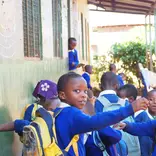 Students at Mrupanga Primary entering the class ready for a mental health club session with FEF