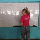 Sisi from France giving lessons to Junior High Students