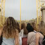 High school students in front of the gates of Versailles