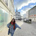 A student smiling in the streets of Nice.