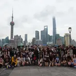Gap students with Shanghai skyline behind them
