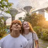EF Gap Year students walking together in Singapore with Marina Bay Sands in the background, enjoying city exploration and tropical surroundings.
