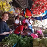 Volunteers purchasing ingredients at the public market