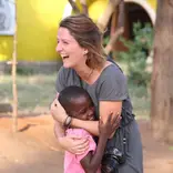 Volunteer with a disadvantaged child in Kenya