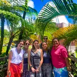 Students pose in front of a Bahai Temple