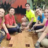 Volunteers in Cambodia building 