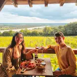 Enjoying at a vineyard restaurant while practicing French during an immersion experience in southwest France