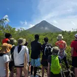 International students observing the Arenal Volcano during a cultural and educational experience in Costa Rica.