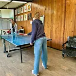 Students connecting and practicing Spanish while playing ping pong during a break at Celas Maya