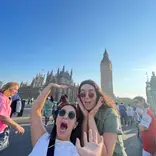 Two women in front of Big Ben in London