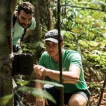 Two students conducting research in Thailand 