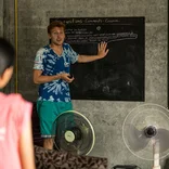 Volunteer conducting public health workshop in Thailand 