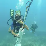 Student diving and conducting research in Mexico 