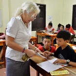 Volunteer working with children Laos